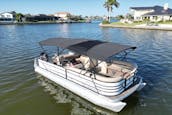 Godfrey Sweetwater 2486 SFL Lounge con un motor de 200 CV