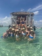 18 passengers 26ft Tiki Boat Adventure in Destin – Crab Island Adventure