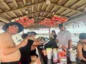 18 passengers 26ft Tiki Boat Adventure in Destin – Crab Island Adventure