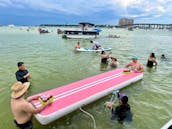 18 passengers 26ft Tiki Boat Adventure in Destin – Crab Island Adventure