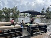 Comfortable and spacious Bentley 240 Cruise 28ft Pontoon in Fort Lauderdale