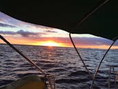 The best Sunset Cruise off Waikiki! Beneteau 43ft Hawaii sailing adventures for snorkeling and swimming!
