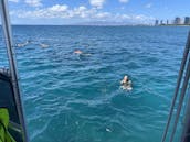 Un catamaran à moteur de 50 pieds peut accueillir jusqu'à 49 passagers à Honolulu