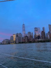 Sail New York's historic waterways aboard Water Music, a classic 40 foot yacht.