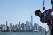 Sail New York's historic waterways aboard Water Music, a classic 40 foot yacht.