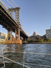 Sail New York's historic waterways aboard Water Music, a classic 40 foot yacht.