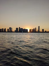 Sail New York's historic waterways aboard Water Music, a classic 40 foot yacht.