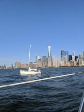 Sail New York's historic waterways aboard Water Music, a classic 40 foot yacht.