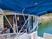 Spend the night aboard a 55' Houseboat-Yacht in a Secluded Lake Travis Cove