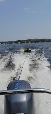 Enjoy a beautiful day on Lake Norman with a 23ft Luxury Tri-toon and free tube!