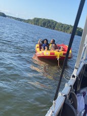 Cruise, swim, party and enjoy on a 2023 Tritoon on Lake Norman!