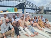 Sydney Harbour Charter on SPELLBOUND a luxury 12m Sailing Catamaran.