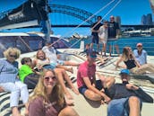 Sydney Harbour Charter on SPELLBOUND a luxury 12m Sailing Catamaran.