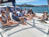 Sydney Harbour Charter on SPELLBOUND a luxury 12m Sailing Catamaran.