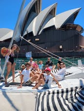 Sydney Harbour Charter on SPELLBOUND a luxury 12m Sailing Catamaran.