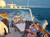 Avoid the Crowds, 62’ft Custom Rayburn Yacht Charter in Nassau to Rose Island, Honeymoon Island and Green Cay area .