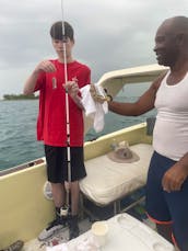 Rent 25' Bertram Powerboat for sightseeing, snorkeling and fishing in Nassau