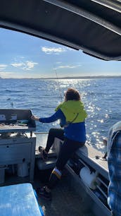 Enjoy Fishing in New Plymouth, New Zealand on Cuddy Cabin