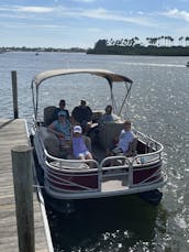 Summer Fun. 20ft Sweetwater Pontoons and sun