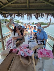 St. Pete Pink Pelican Tiki Boat - Up to 18ppl