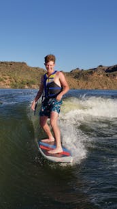 Enjoy a carefree day at Saguaro Lake with Captain Sheldon on a new 2024 wakeboat