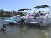 28ft boat with cabin swim platform joy ride to Peanut Island & Sandbar